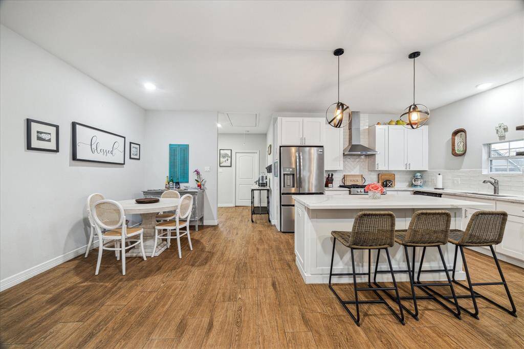 Plenty of seating between large dining area and breakfast bar