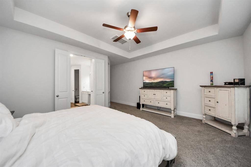 It's the perfect space for both rest and relaxation, with ample room for a sitting area or cozy retreat.