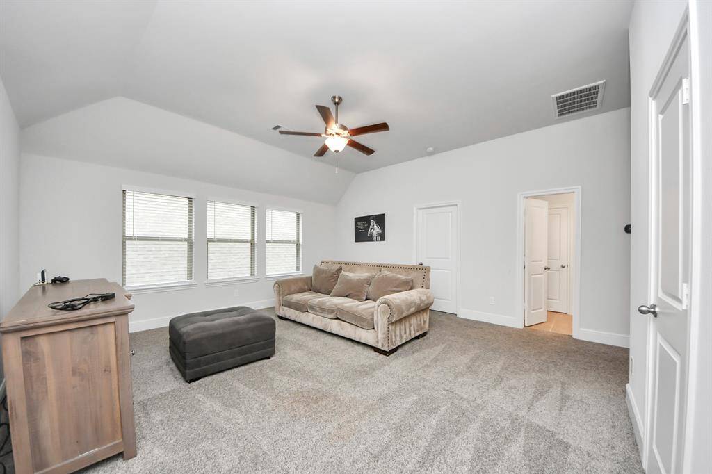 As you walk upstairs to the game room, you'll find the ideal space for the kids to enjoy video games or a friendly game of pool.