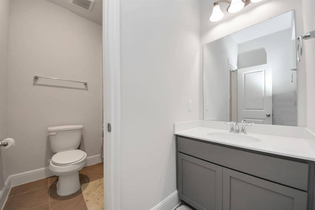 Functional and spacious powder room.