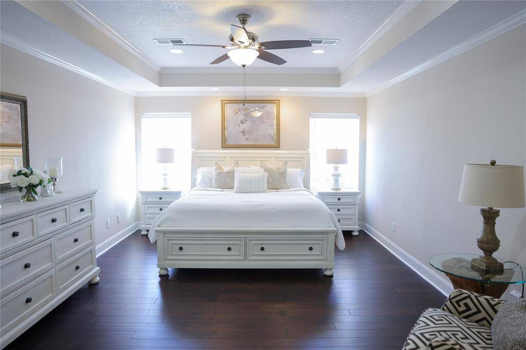 Primary bedroom large enough for king size bed and sitting area