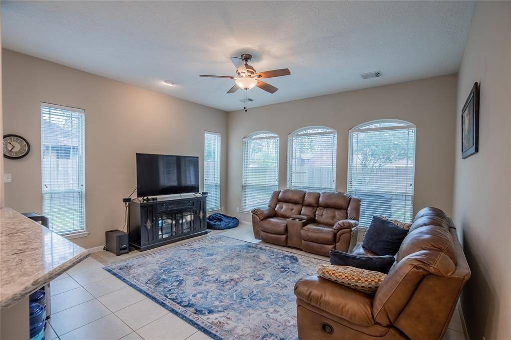 Large windows in both kitchen and den allow such wonderful natural light in this home!