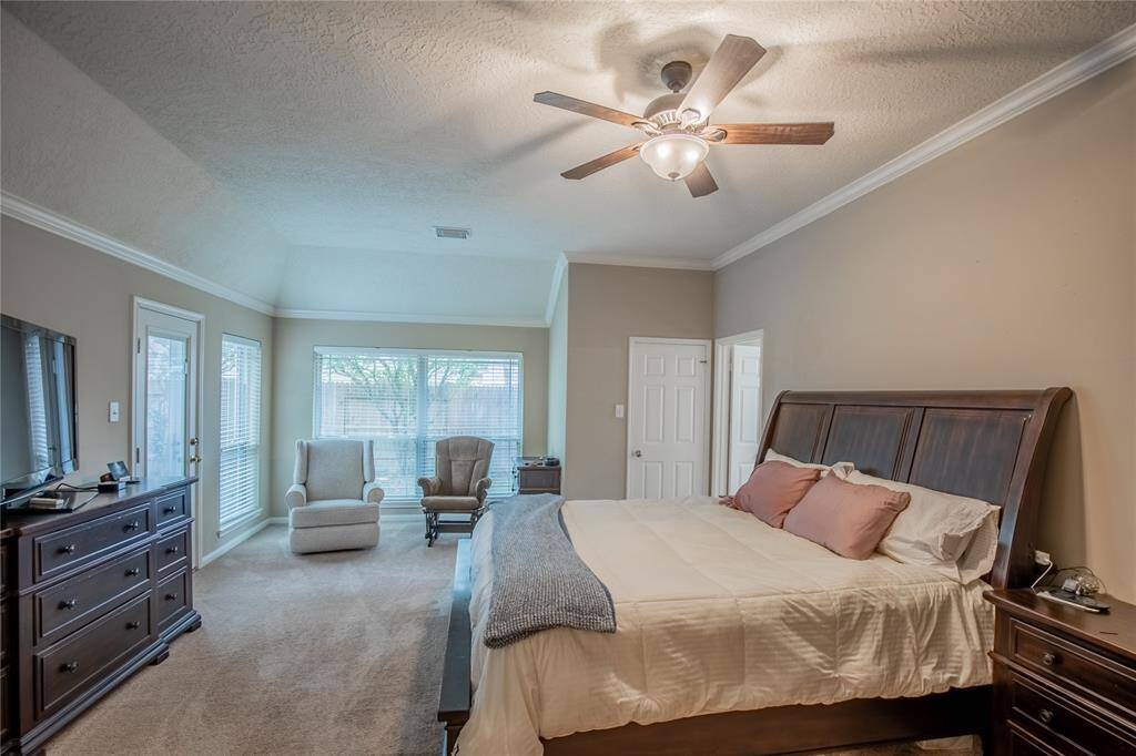 Spacious Primary Suite features additional space for sitting area, desk, etc!