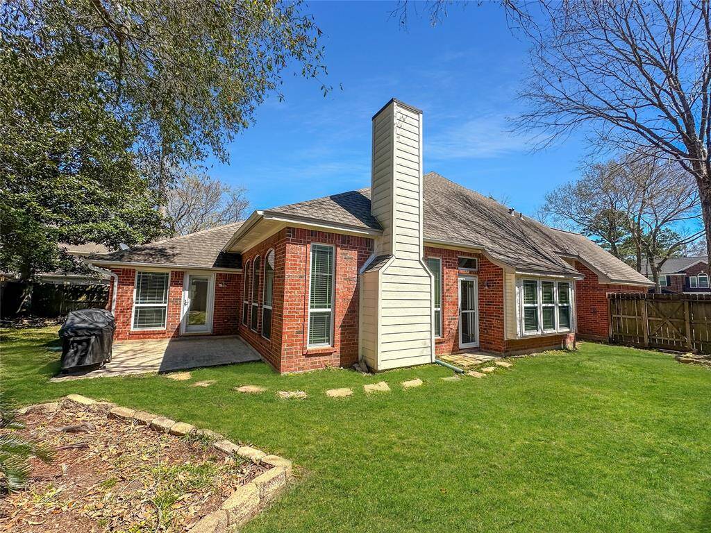 Beautiful entry features a double set of French doors leading to a versatile front room!
