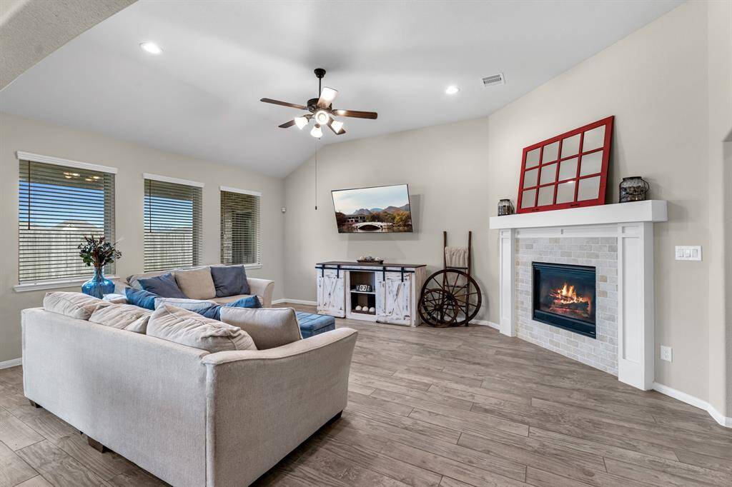 Spacious living room with cozy fireplace