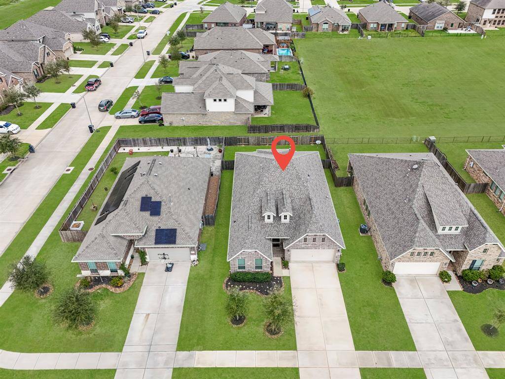 Located just off the corner of one of the public playgrounds and parks.
