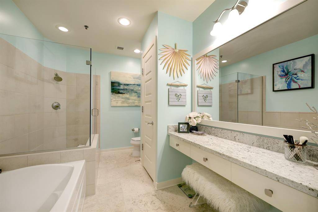A separate tub and shower along with a vanity area ensures a spa-like experience in the Primary bath.