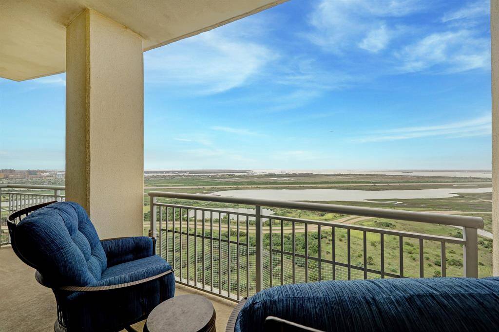 The Primary bedroom balcony includes bay views and is a great place to curl up with a book or drink your morning coffee.
