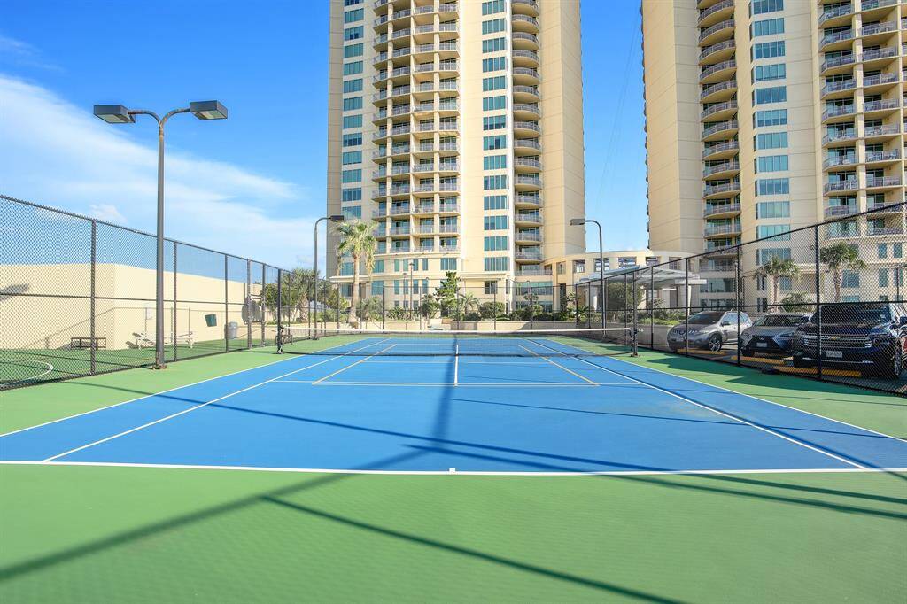 Tennis/Pickle Ball Court and nearby Basketball Court.
