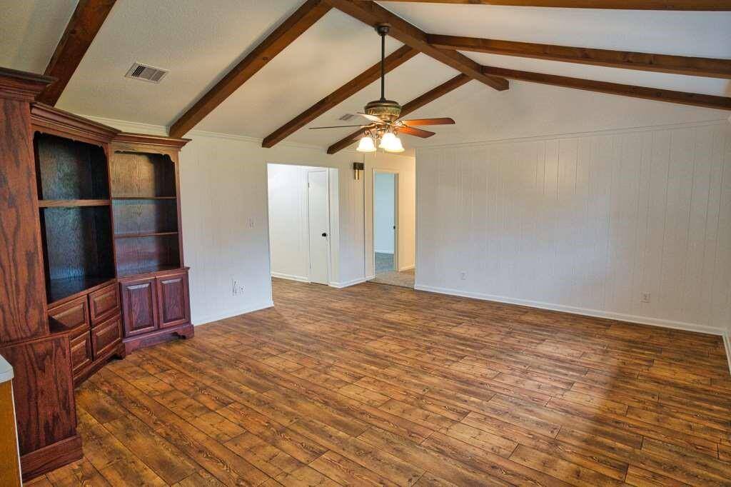 Tall Beamed Ceiling enhances this room. Notice the beautiful flooring?