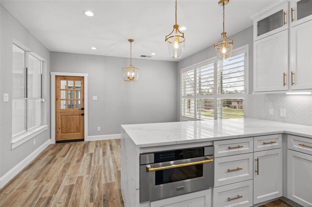 Large utility room with 1/2 bathroom