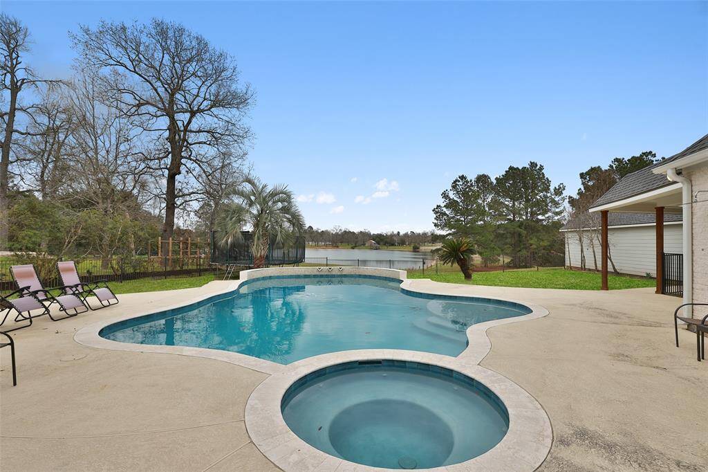 Recently updated pool overlooks the pond