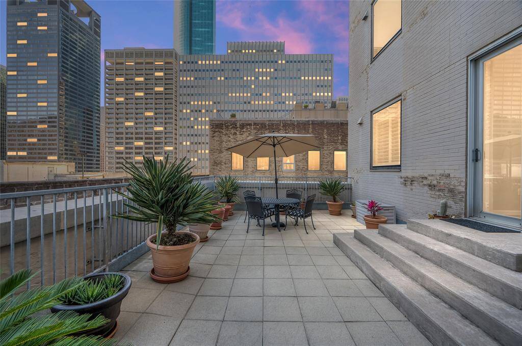 Expansive private terrace of Commerce Towers #1213 is approximately 32'x17'* and is truly a rarity in Downtown Houston. The terrace extends the living & entertaining spaces of the home to the outdoors with Houston's skyline overlooking it. All pots, planters and outdoor furniture are included in sale of home. *Buyer to verify dimensions.
