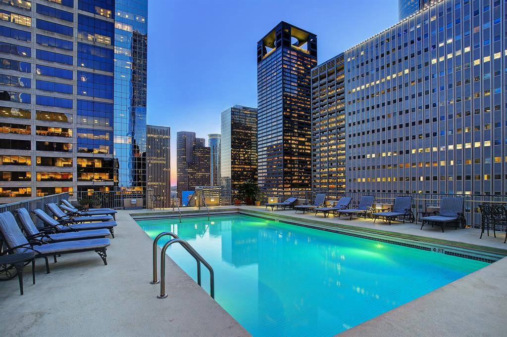 A dusk view of Commerce Towers heated rooftop pool! Imagine relaxing by the pool in the evenings with the twinkling lights of the surrounding buildings!
