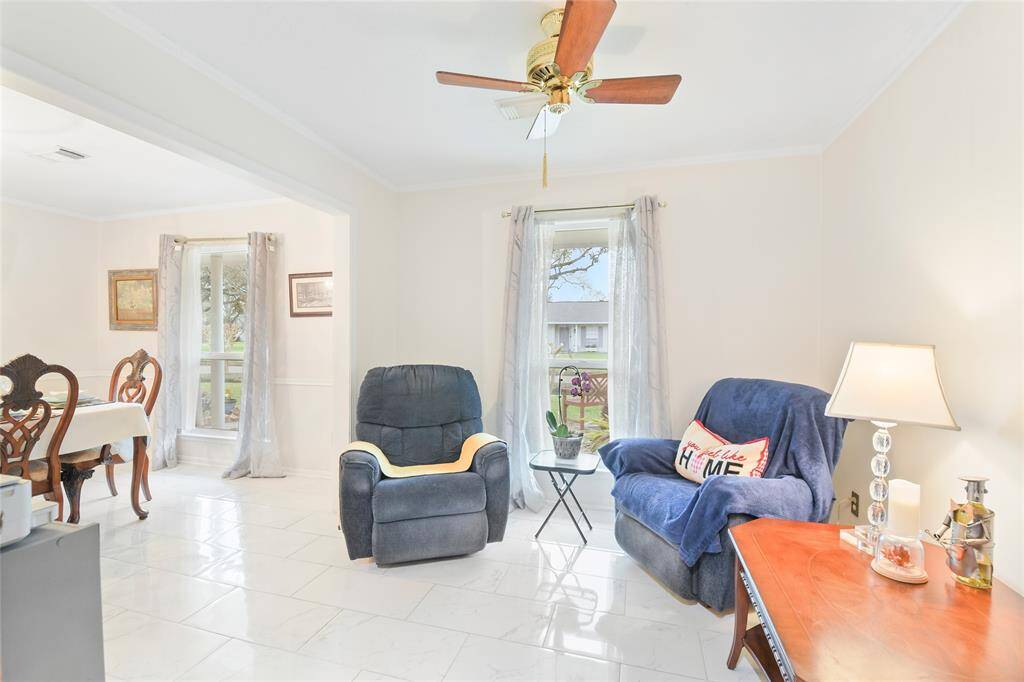 Whether used as a cozy lounge, home office, or flex space, this room enhances the home's functionality and appeal!