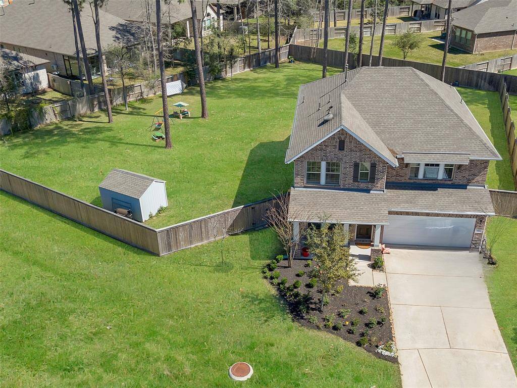 Welcome to this bricked beauty at 103 Scarlet Maple Court! Sitting on an almost 1/2 acre lot, it's a RARE find!
