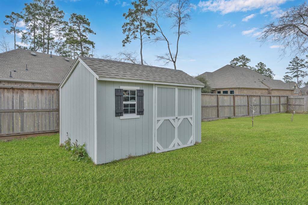 Storage shed included!