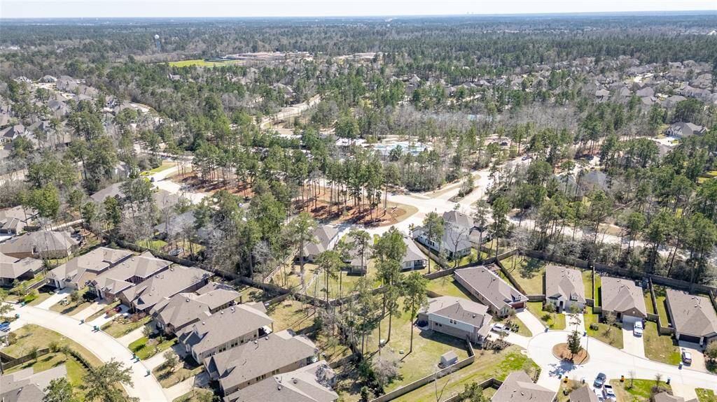 If you aren't familiar with the Woodlands Hills, it's a very desirable community with abundant natural beauty.