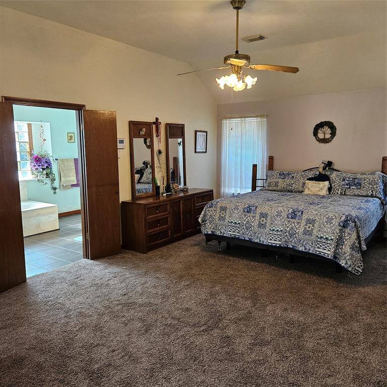 King size bed in huge bedroom