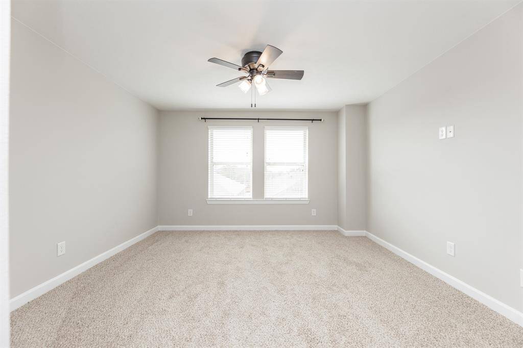 Upstairs secondary bedroom with private bathroom.