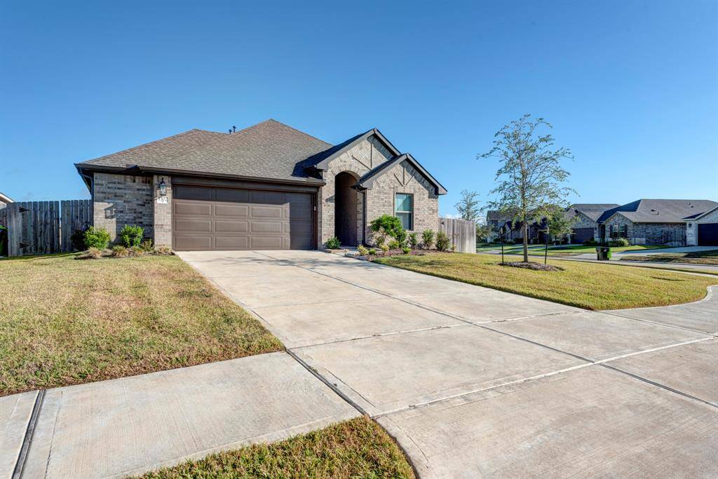 Welcome home to 1302 Wild Mustang. Home sits on a corner lot and has the 2.5 garage feature.