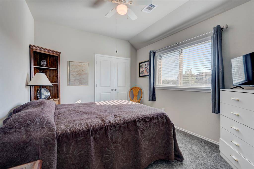 Bedroom 4 has a side view of the home.