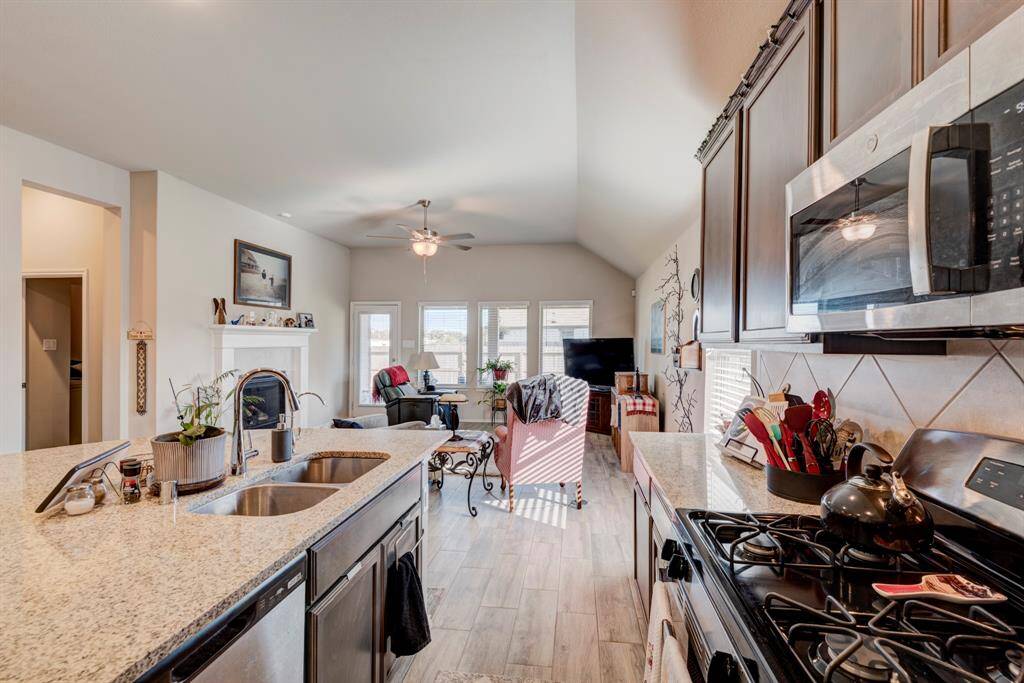 Open floor plan concept.  Plenty of windows providing natural light and a view to the back yard.