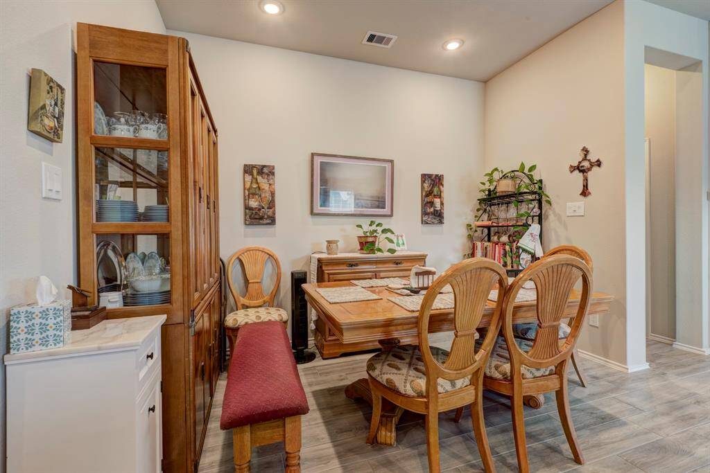 Another picture showing the dining area.  the hall way to the right leads to bedroom 4 and can be considered a mother in laws suite with access to bathroom 3.