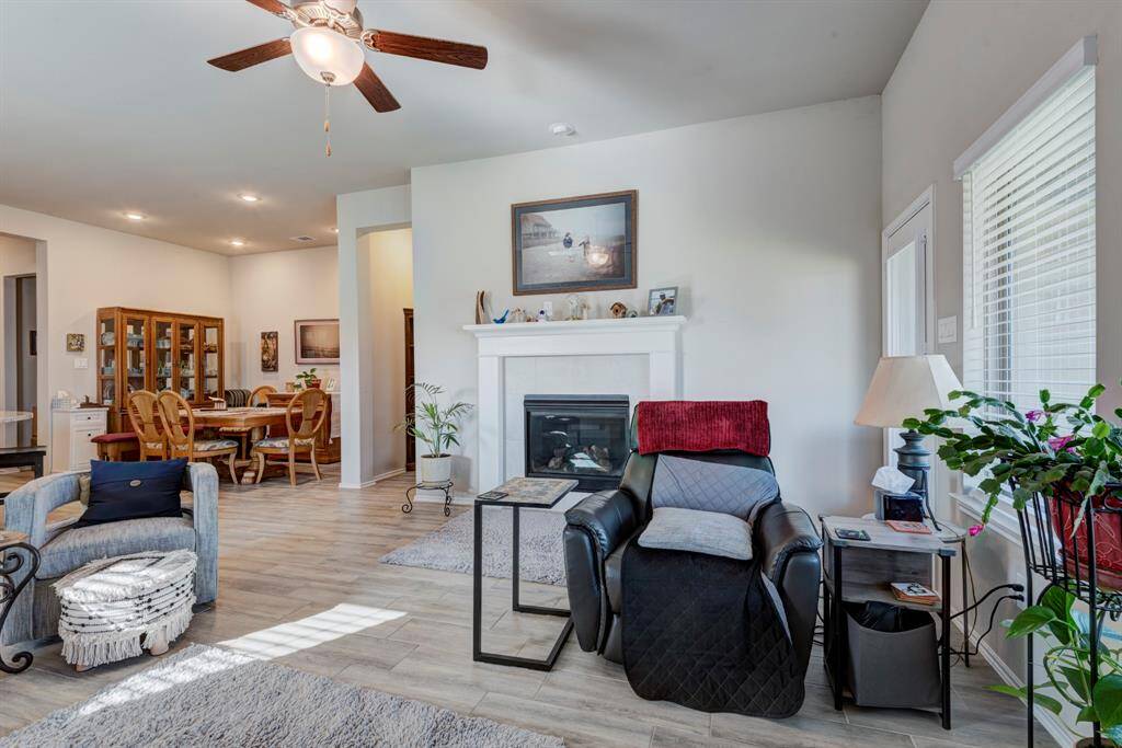 Family room is in the back of the home and has a gas remote control fireplace.