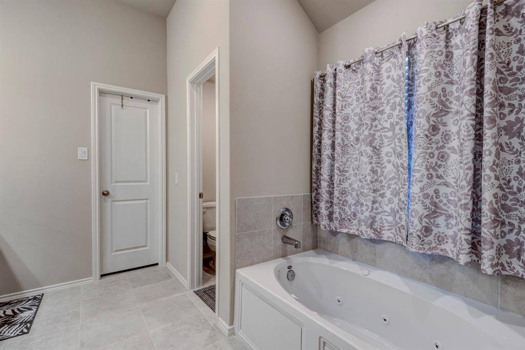 Home owner chose the jacuzzi tub option when building.