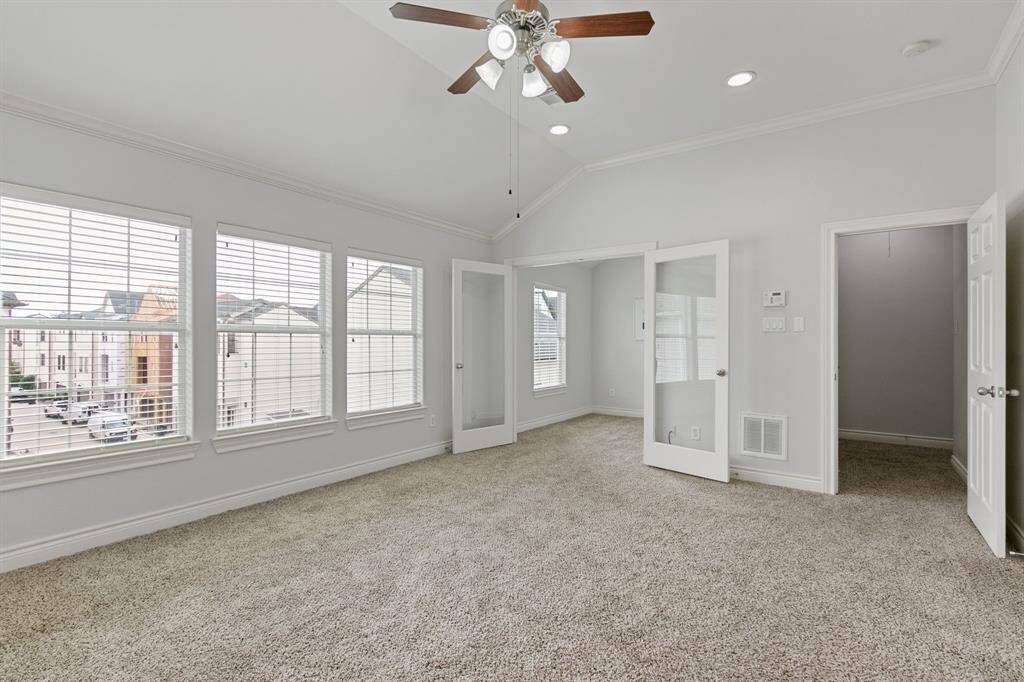 Fabulous owner's suite has fresh paint, recent carpet and an extra room through French doors perfect for an office, flex room or nursery.