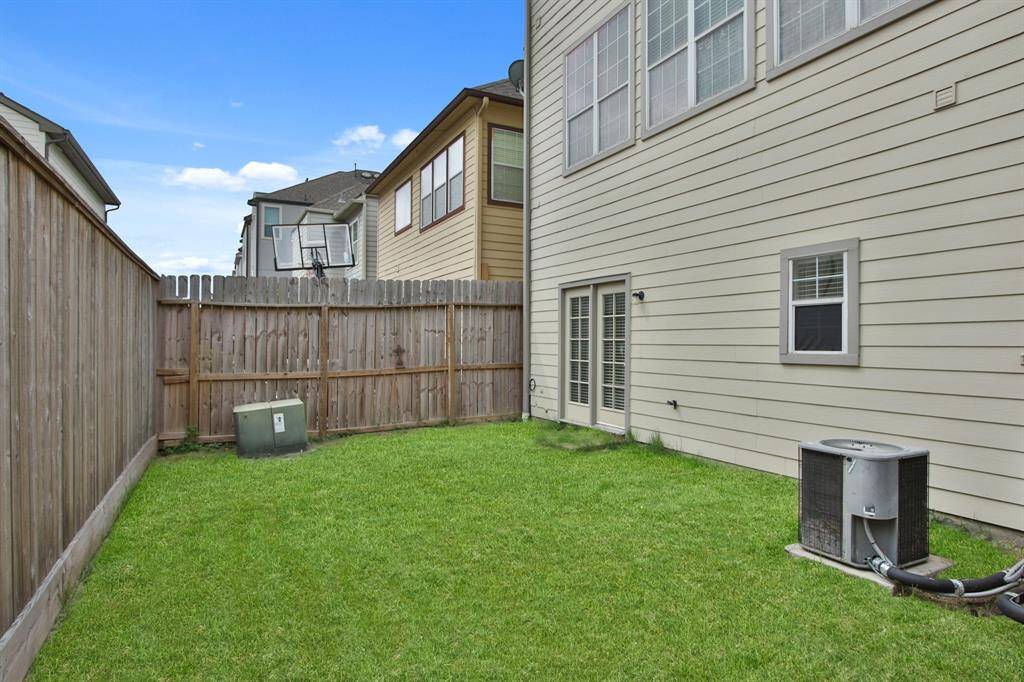 Opposite view of your nice sized fully fenced private backyard.