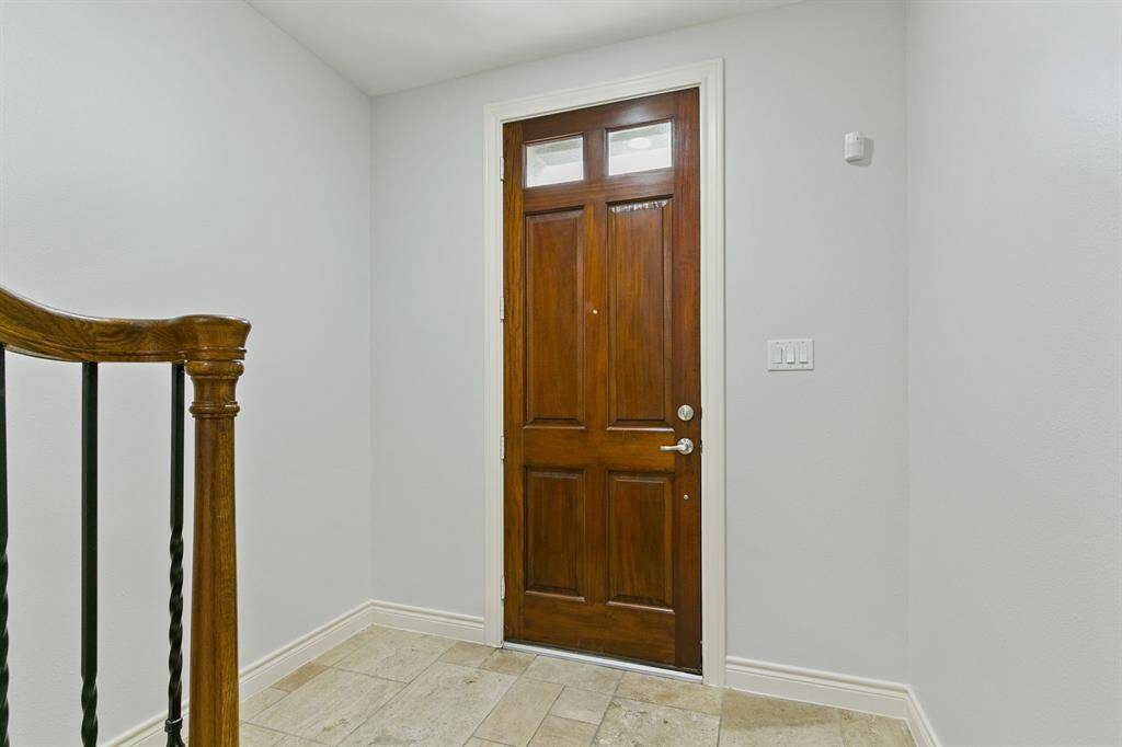 Large, tiled entry as you enter the home. Home is freshly painted.