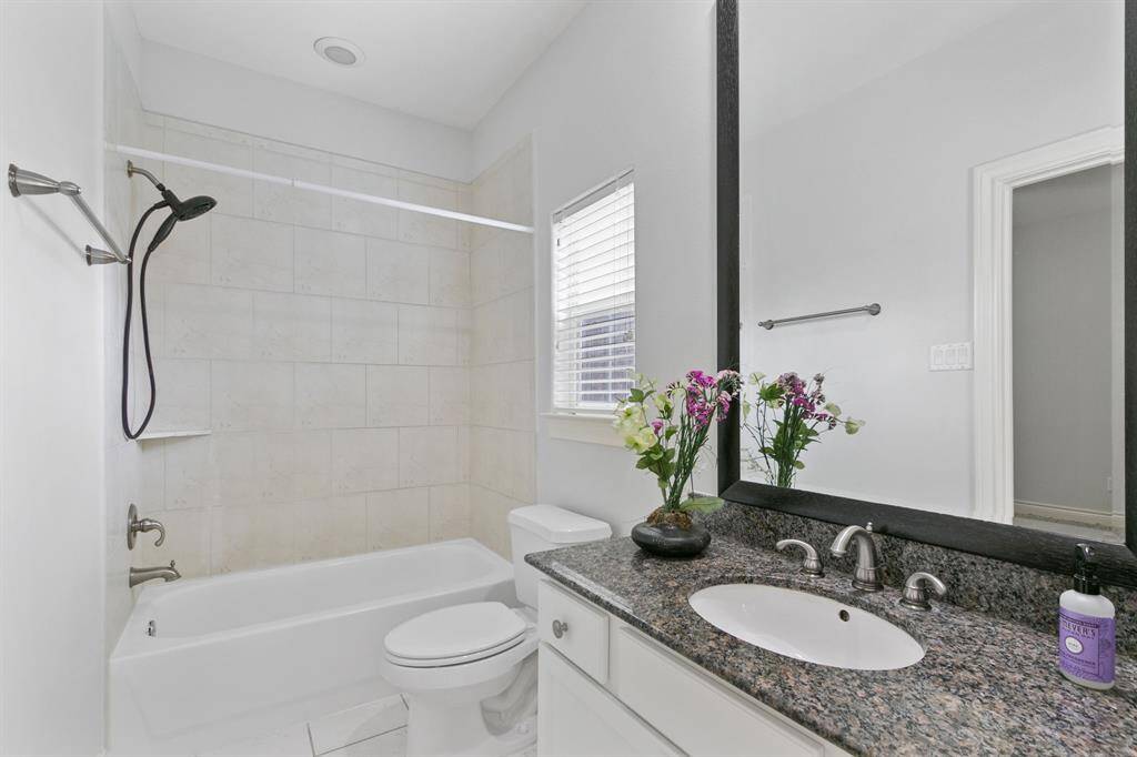 Lovely full bathroom in first floor bedroom.