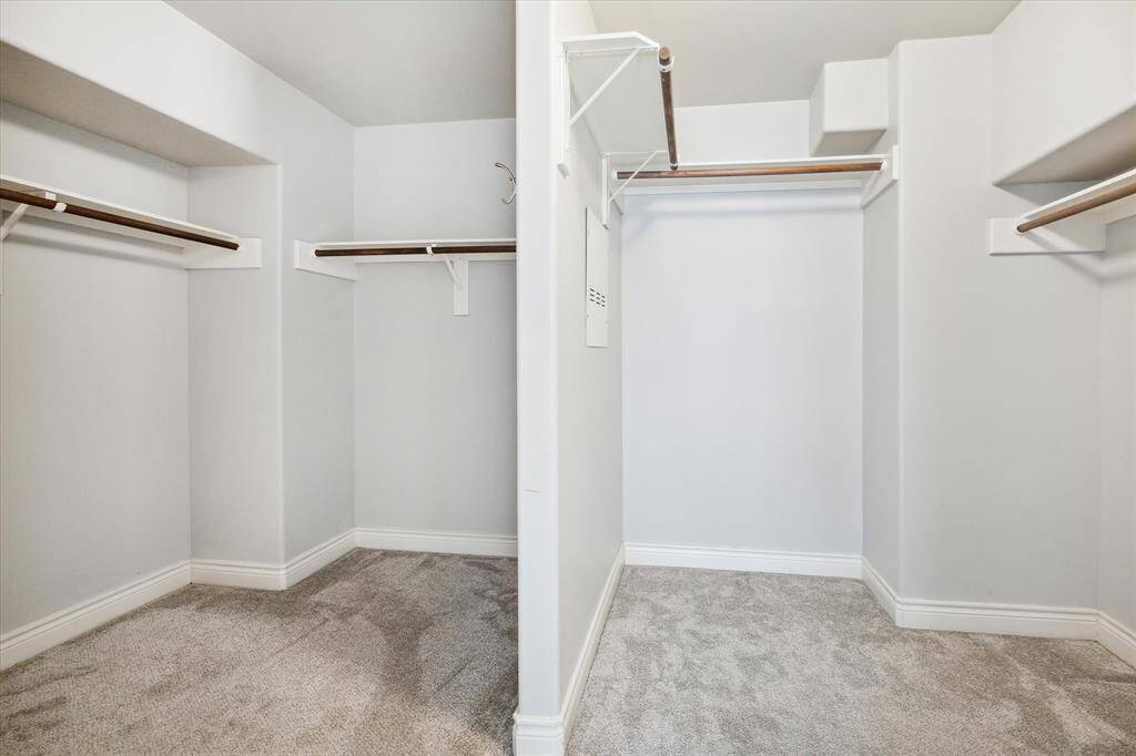 Tons of space in the large primary bedroom closet!