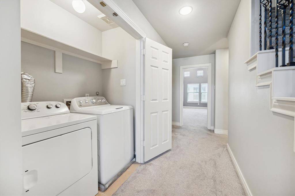 Utility room is conveniently located on the second floor near bedrooms.