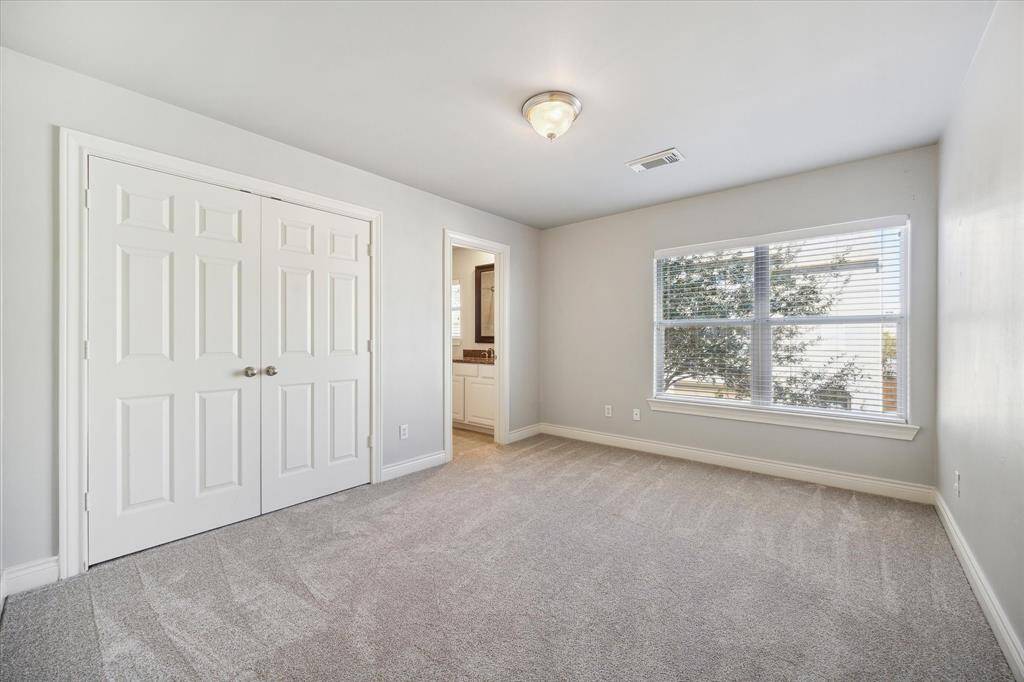 Secondary bedroom located on the second floor.