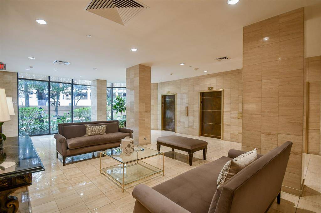 The stylish reception area greets you with a modern design and sophisticated ambiance, setting the tone for the luxury and comfort that await throughout the building.