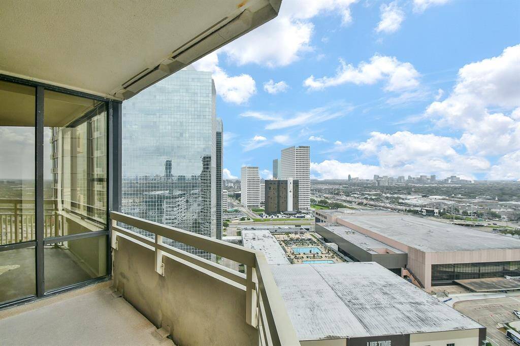 The spacious private balcony offers plenty of room to relax or entertain while enjoying the outdoors and taking in the surrounding views.
