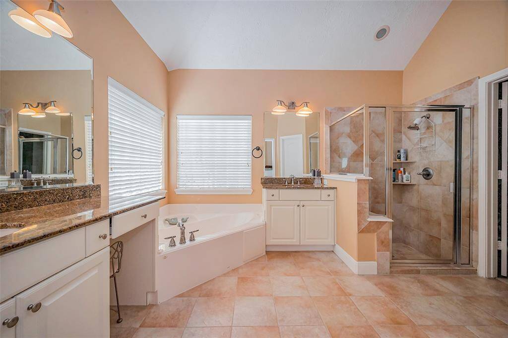 Primary ensuite bathroom, double sinks, jetted tub and separate shower.