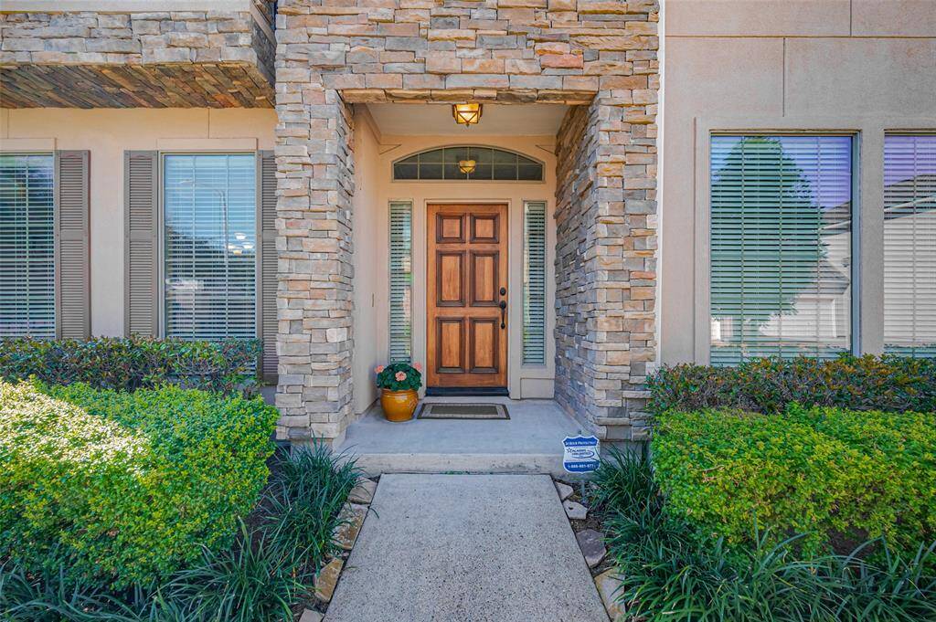 Warm and inviting covered entrance.