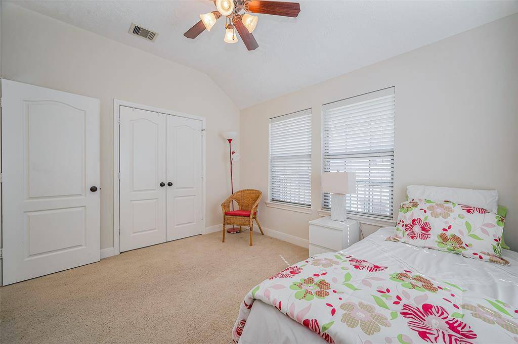 Light and bright secondary bedroom with nice closet.