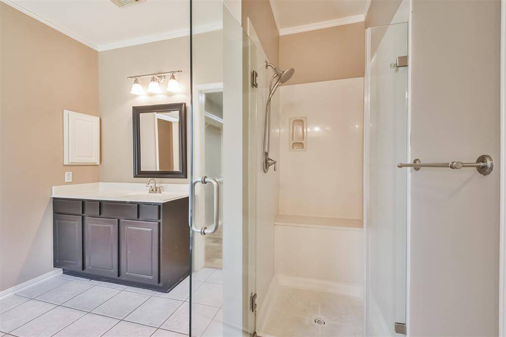 View of the walk-in shower for the primary bathroom.