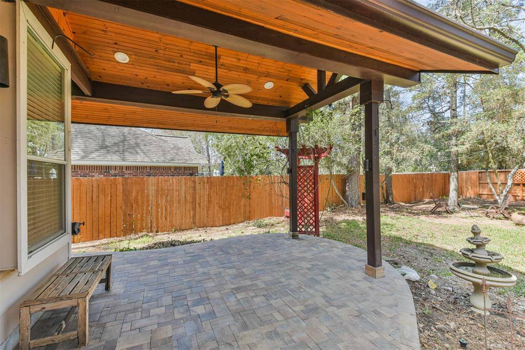 The oversized covered patio was recently built and has a beautiful wood ceiling, gutters, ceiling fan and LED lighting. The patio was also repaved and is ready for your outdoor barbeques.