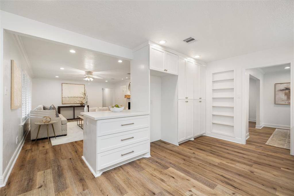 View of how this kitchen opens to the living room.