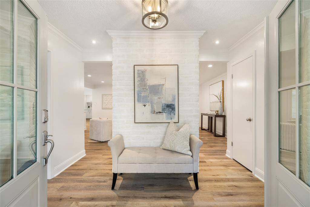 Double front doors open to greet you in this welcoming entry way - you will love all the natural light here!