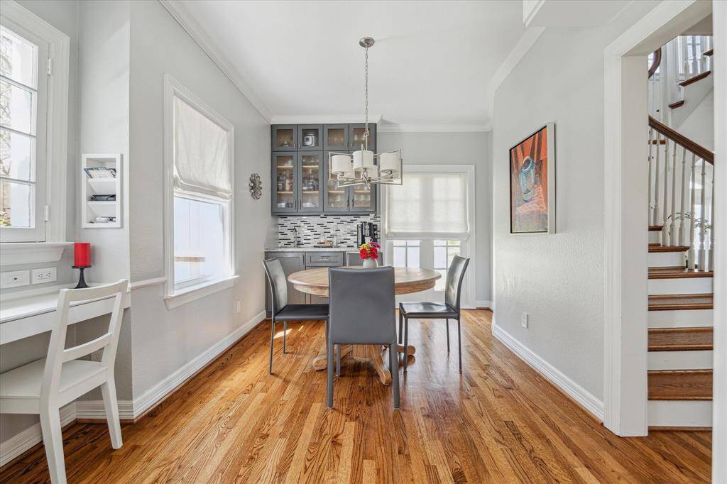 Breakfast room with built-in wet bar and built-in desk.