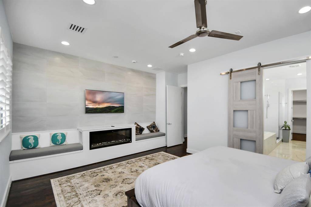 Primary Bedroomelectric Mantel Fireplace