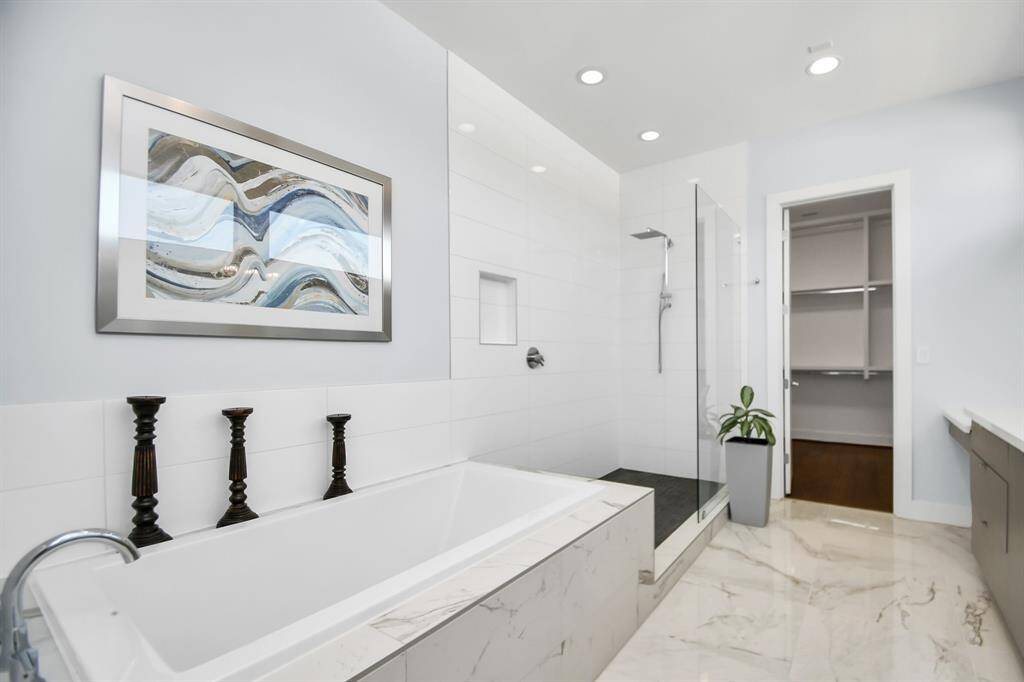 Primary Bathroom Jacuzzi tub and stand shower