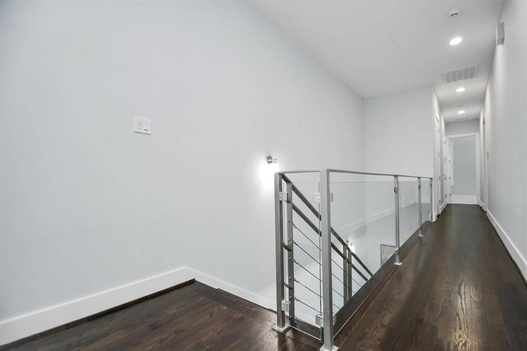 Glass railing third floor hall